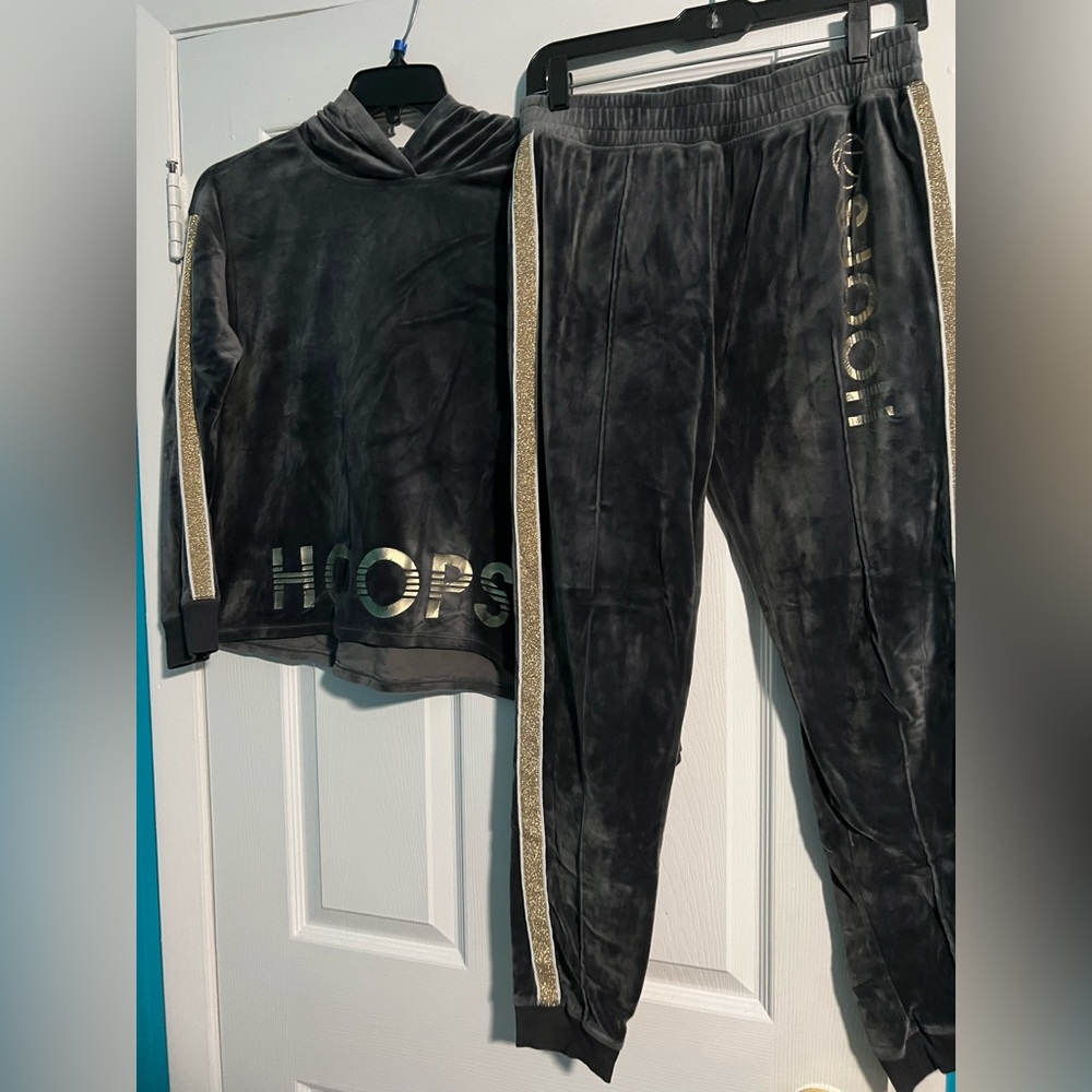 I am selling a grey sweatsuit from Justice. It is very comfortable.